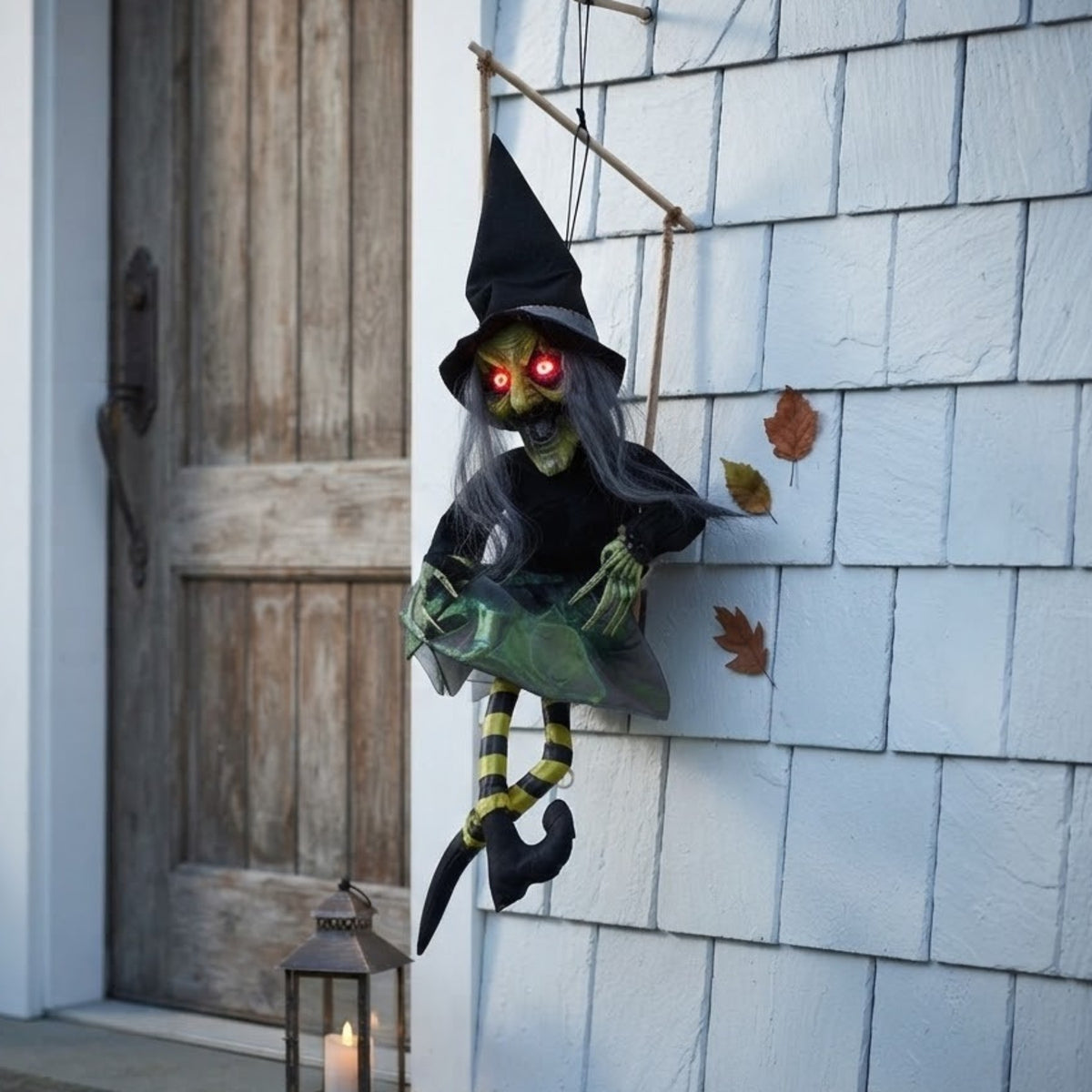 Hanging Animated Kicking Witch on Swing