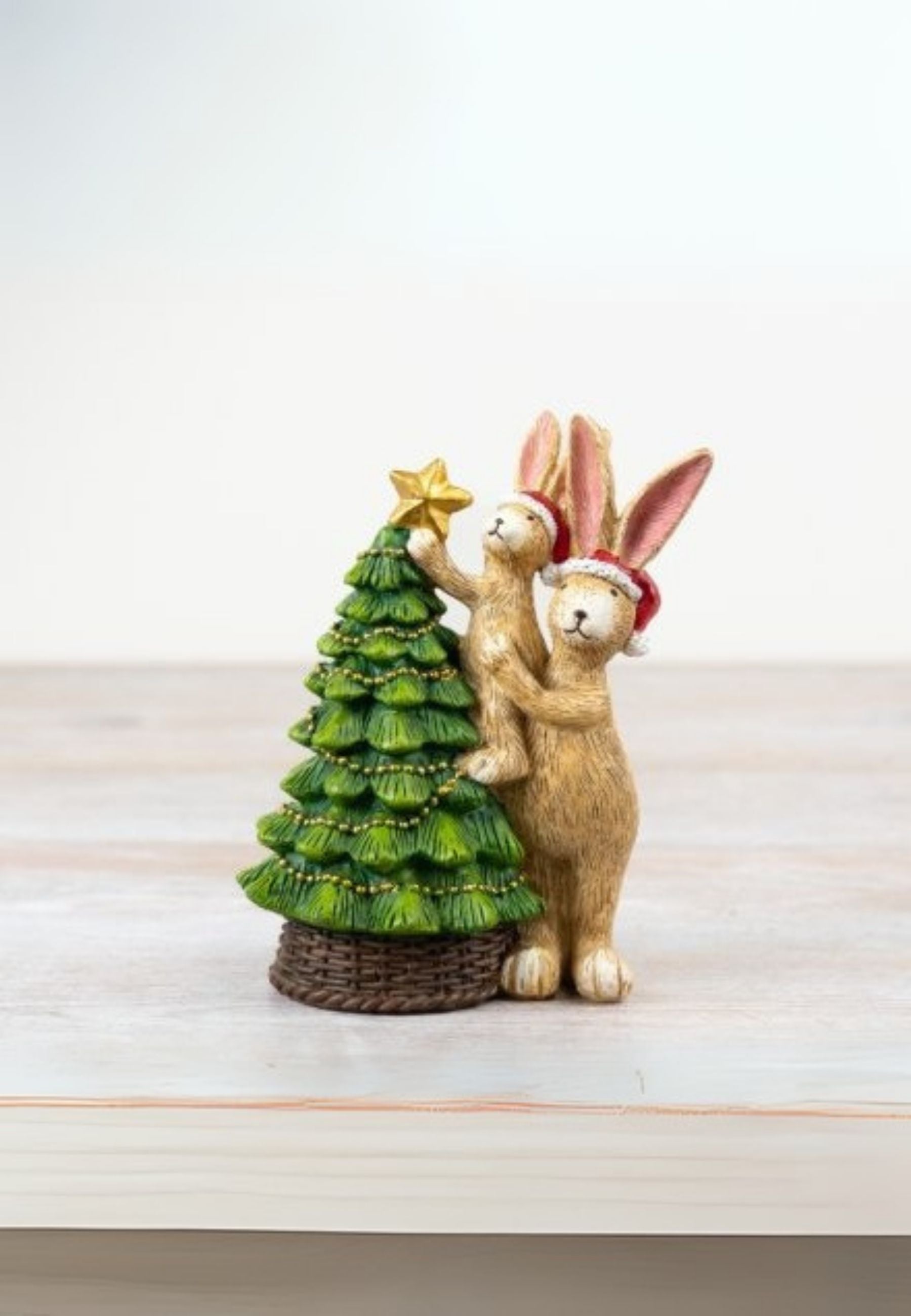 Jasper Rabbit Holding Star Xmas Tree