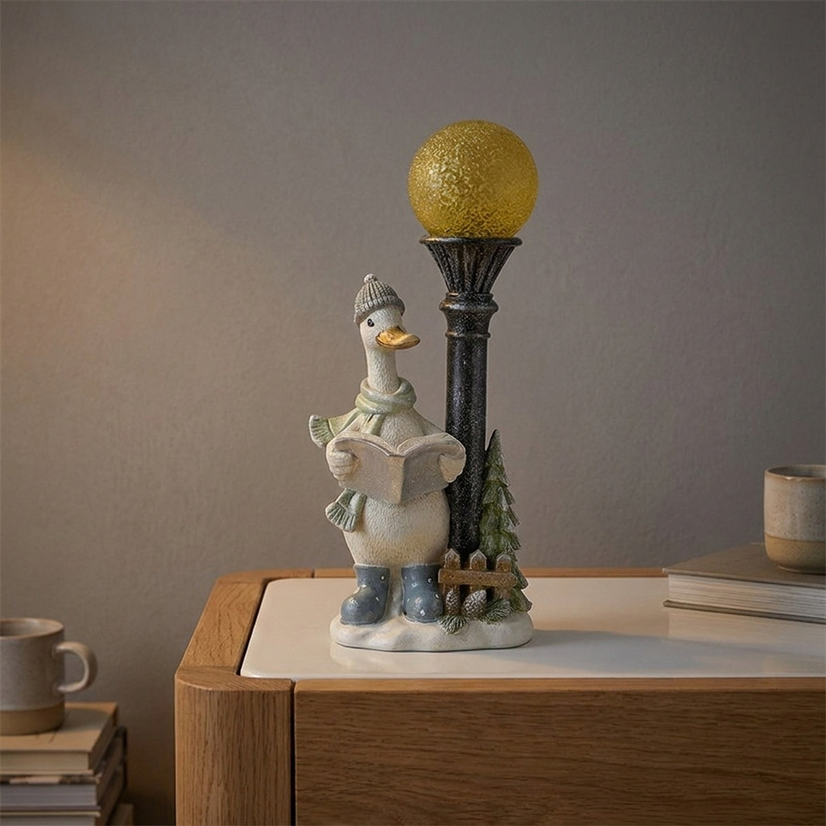 Illuminated Duck Figurine Reading Newspaper