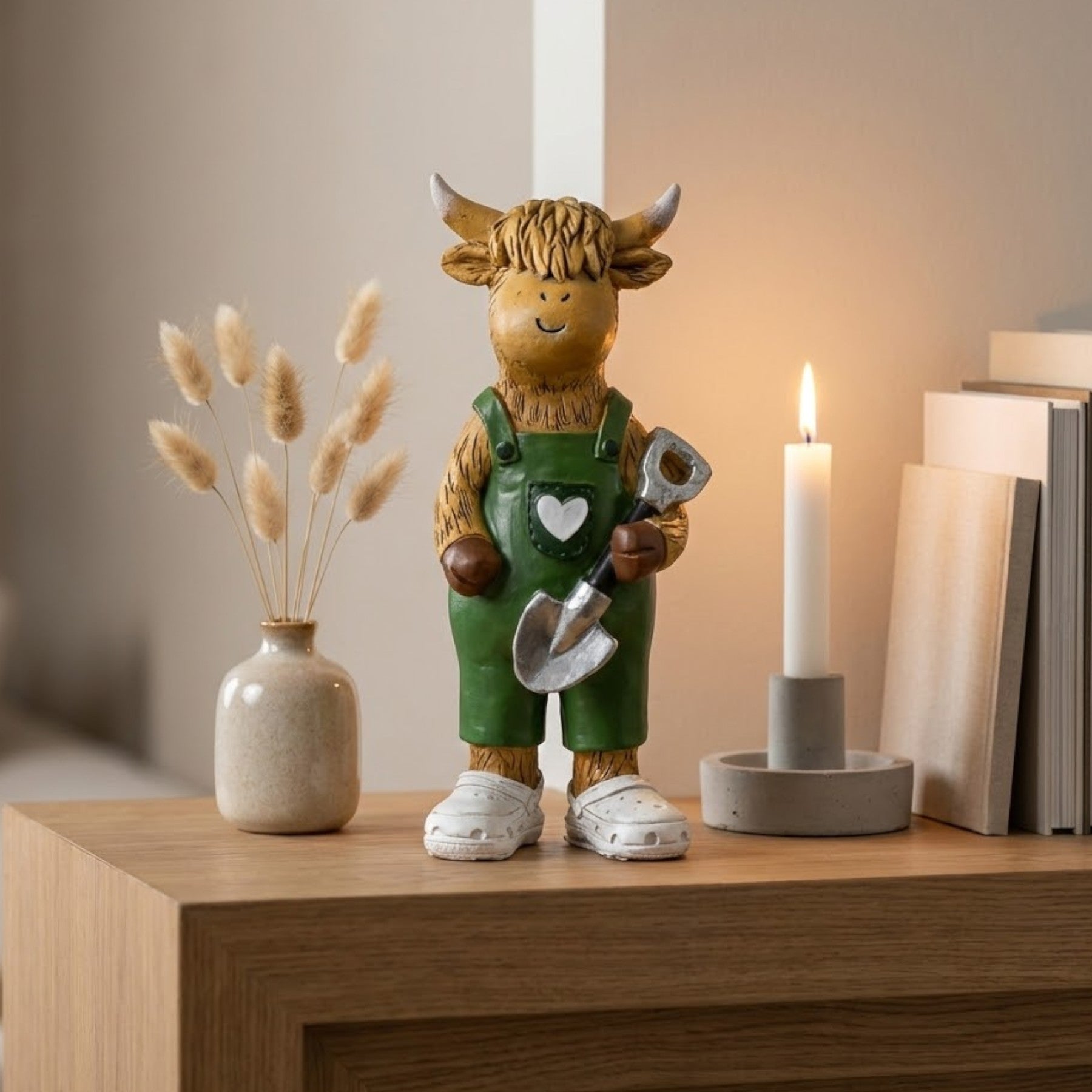 Highland Cow Holding Shovel Ornament
